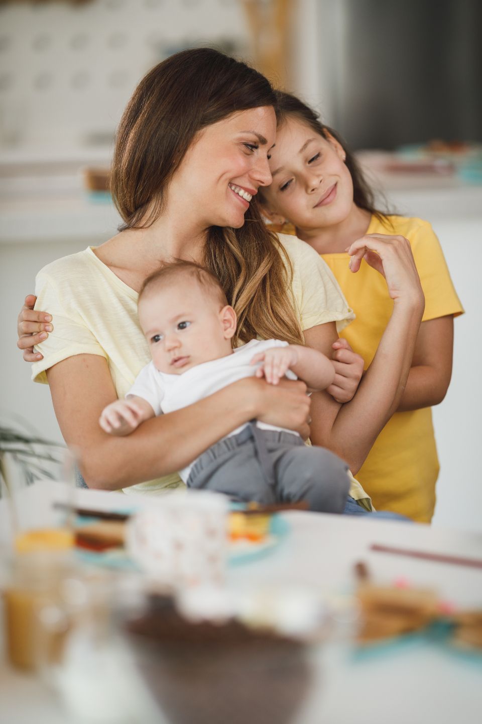 A parent and child looking at schoolwork together
